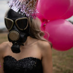 A woman wearing a gas mask.