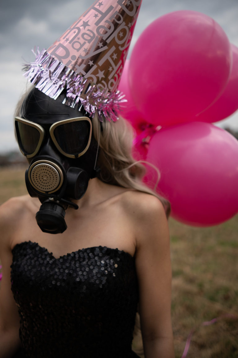 A woman wearing a gas mask.