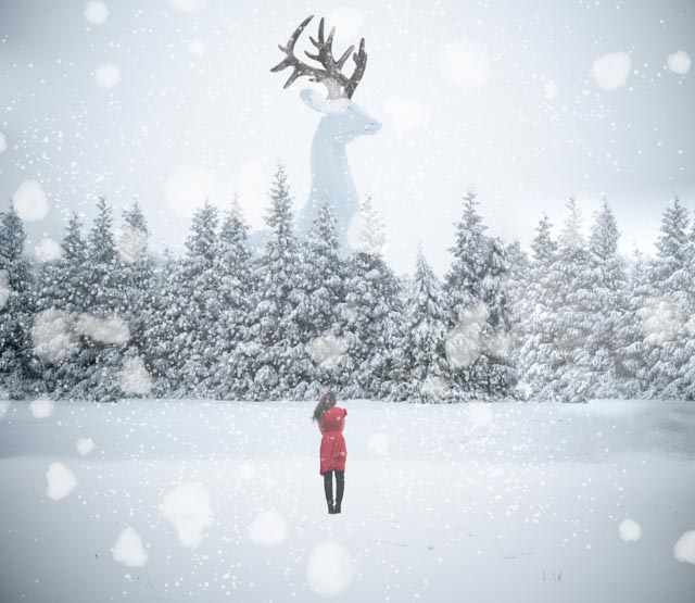 A single girl in a red coat stands in a snowy field, gazing at a large reindeer statue amidst snow-covered trees, capturing the essence of a serene Christmas scene.